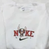 Nike x Stitch Saw Jigsaw Biker Embroidered Shirt, Custom Nike Embroidered Shirt, Funny Halloween Embroidered Shirt